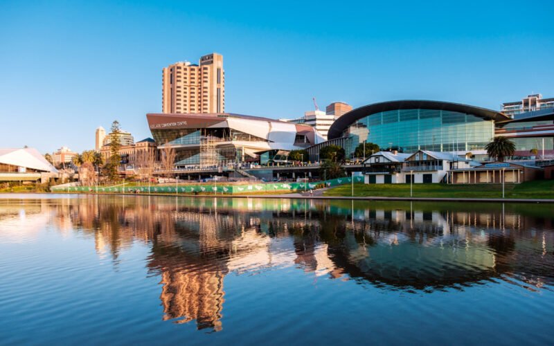 Adelaide, Australia - September 11, 2016: Adelaide city centre viewed from the north side of Torrens river in Elder Park on a bright day